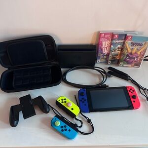 Nintendo Switch Console with extra Joy‑Con and Accessories